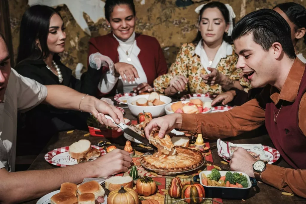 A group of friends celebrating Thanksgiving together.