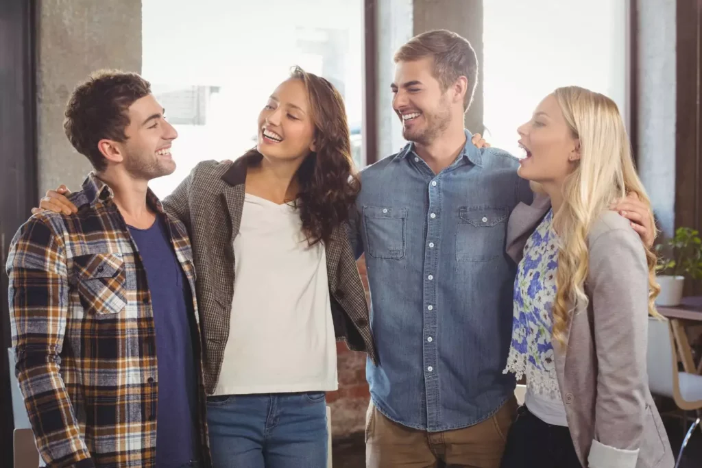 4 people with their arms around each other, great relationships