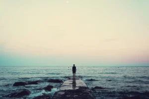 a man standing on a bridge