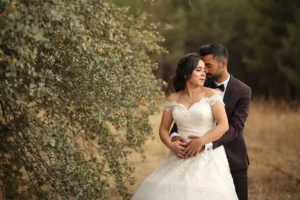 groom hugging his bride, they save their virginity for marriage