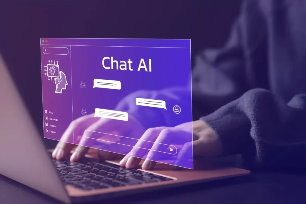 a person working on a computer, "talking" with and AI chat bot